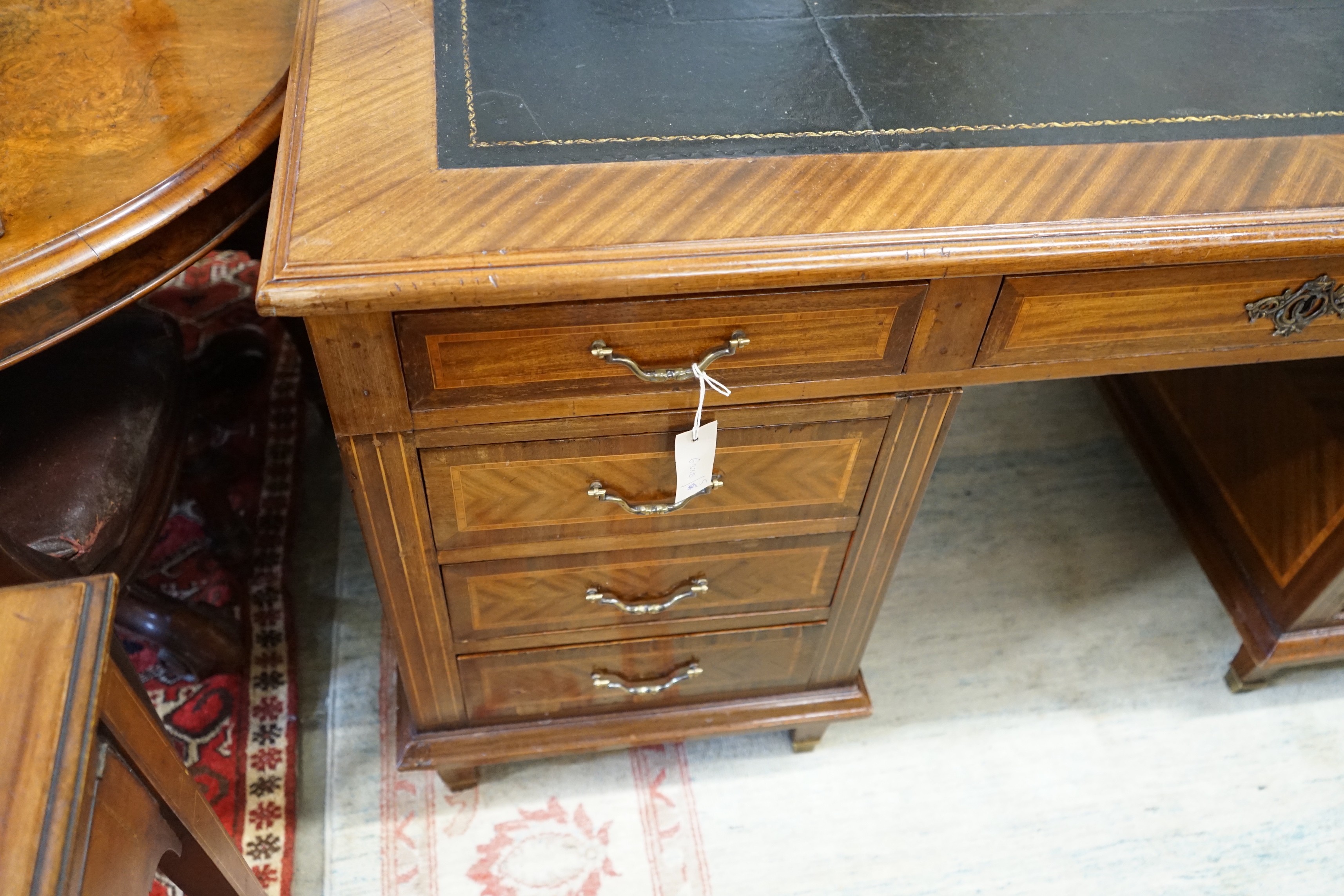 A mid 20th century French satinwood banded mahogany pedestal partner's desk, length 150cm, depth 98cm, height 79cm